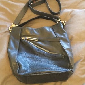 Kelsi Dagger "Izzy" Crossbody bag.